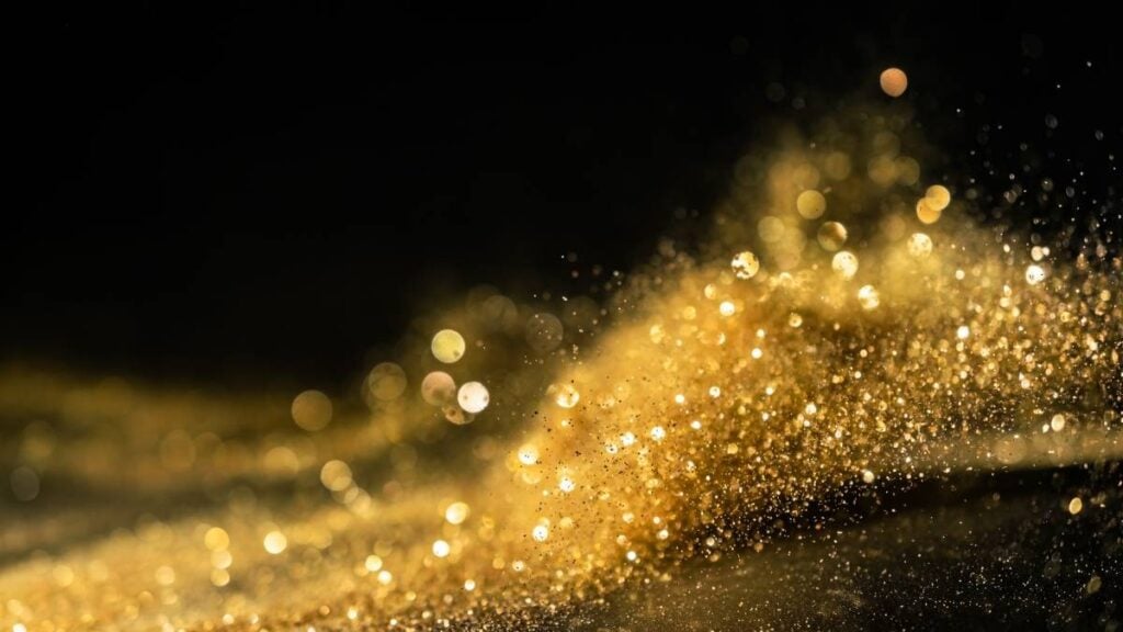 polvere di oro su fondo nero