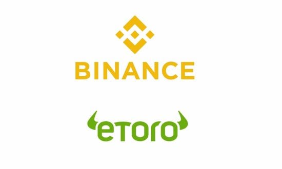 Loghi di Binance e eToro su sfondo bianco.